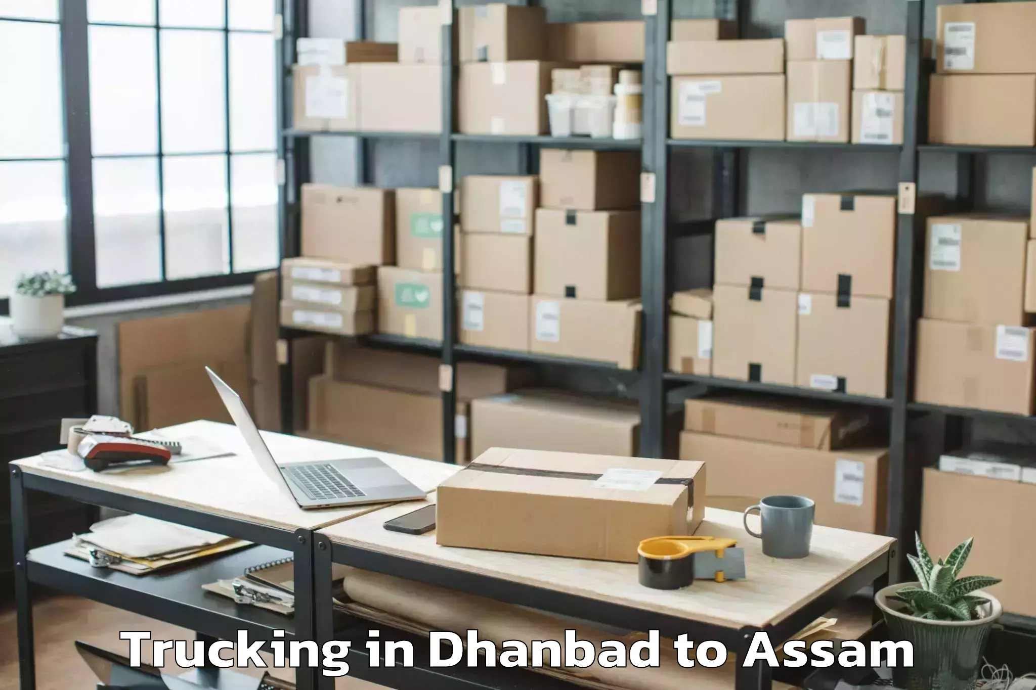 Dhanbad to Gossaigaon Pt Trucking